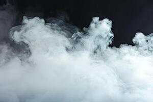 Delicate tendrils of white smoke rise and curl against a dark background, evoking mystery and intrigue in a dynamic display of movement photo