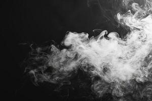 Tendrils of white smoke rise, twisting and curling in the dark, forming ethereal shapes that evoke a sense of mystique and allure photo