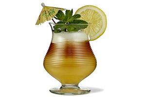 Bright cocktail showcasing vibrant colors with a lemon slice, fresh mint, and a decorative umbrella, perfect for summer gatherings and celebrations photo