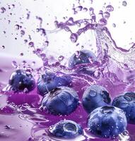 Blueberries create a lively splash in vibrant purple liquid, showcasing the beauty of fresh fruit and fluid dynamics in bold colors photo
