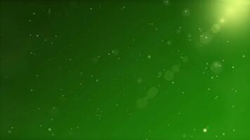 Loop particles on green background video