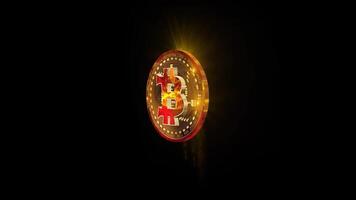 The golden Bitcoin coin spins spectacularly, shimmering with colors and sparkling with edges. video