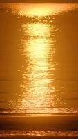 Wave splashing in sunrise on a tropical beach. video