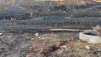 Steel bars are arranged at a construction site, essential for strong foundations and robust structures photo