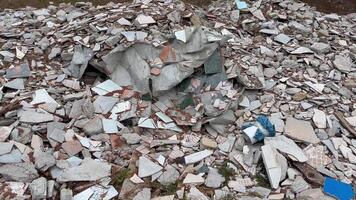 An extensive, substantial pile of construction debris vividly showcasing shattered materials, waste, and refuse photo