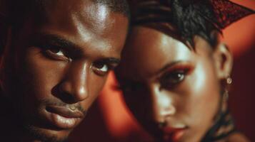 Closeup Portrait of a Sensual Couple Against Red Background photo