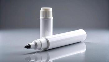 White Paint Marker On Black Studio Surface photo