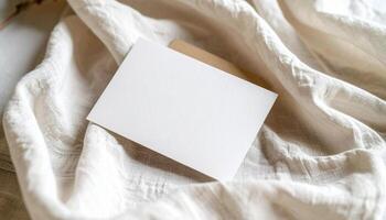 White Postcard On Linen Fabric With Paper Texture photo