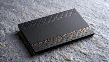Thick Cardboard Business Card With Rope Emboss And Black Foil Layer Detail photo