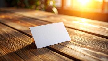 White Cardboard Business Card With Fiber Texture At Angle On Wooden Table Rustic Charm photo