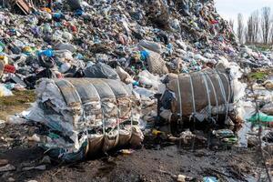 Immense Landfill Accumulation with Baled Waste Material and General Trash photo