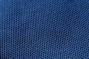 Blue jean texture. Blank denim cloth textile background. Soft fabric. Flat cotton surface. Grunge structure design. Copy space photo