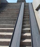 Ramp for people with disabilities and for those who has reduced mobility or for people with wheelchairs or bicycles photo
