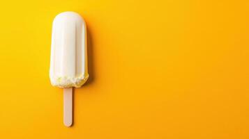 Vanilla ice cream popsicle on yellow background with creamy texture and vibrant contrast creating a fresh and appetizing summer dessert visual. photo