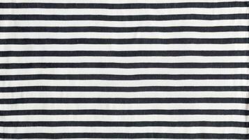 Black and white horizontal stripe fabric texture with woven surface pattern showing repetitive lines and classic textile design. photo