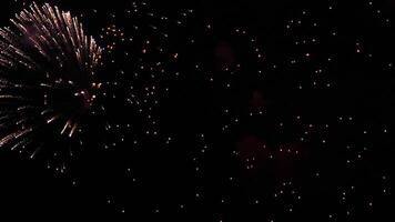 Firework explosion in sky with colorful sparks and embers, night sky, fireworks burst, light show video
