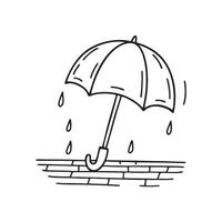 A rain soaked umbrella left open on the balcony floor vector