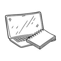 A notepad sitting beside a shut laptop on the table vector