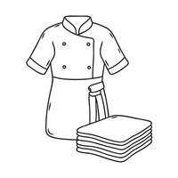 A chef outfit folded next to an apron on the table vector