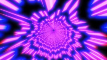 Vivid pink and blue tunnel with geometric patterns and glowing spikes, forming a kaleidoscopic spiral effect video