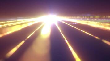 A golden light rays bursts outward in a radial pattern from a central glowing point video