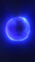 Bright blue glowing sphere with a soft light halo, floating in a deep dark background, evoking a futuristic cosmic object video