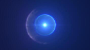 Futuristic glowing energy sphere emitting radiant blue light on a dark background, with lens flare effects and soft gradient edges video