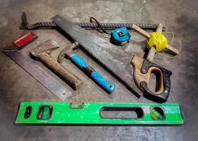 Essential Tools for Construction Work. A variety of essential hand tools commonly used in construction and carpentry work. photo