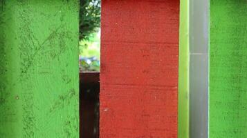 Multicolored wooden fence. natural background. photo