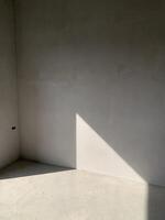 light and shadow on wall background photo
