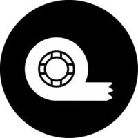 A black and white icon of a roll of tape vector
