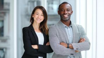 Confident business couple portrait in modern office environment photo
