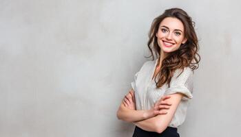Cheerful woman posing confidently studio portrait neutral side view photo