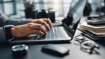 Corporate professional working on laptop in modern office environment photo