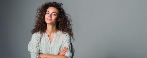 Confident woman smiling in studio portrait happy expression close-up photo