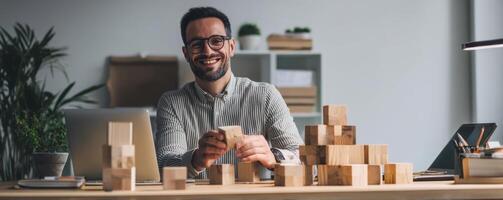 Entrepreneur smiling while building business ideas in office photo