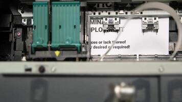 Close-Up of Printer Heads Printing a Document in a Modern Office Environment with Precise Ink Mechanisms video