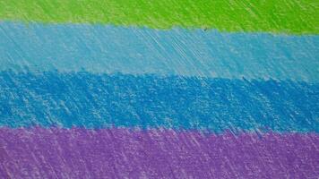Vibrant Abstract Texture of Multicolored Chalk Pastels on Rough Canvas Surface in Natural Light video