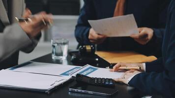 A business meeting with two people at a desk video