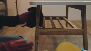 A person sitting on a chair with a table and a chair video