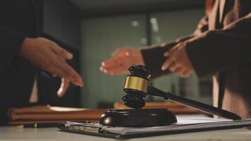 Businessman and judge shaking hands in court video