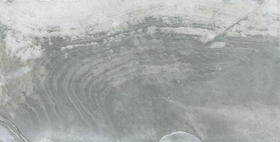 a close up of a large rock with a hole in it photo