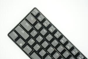 A mechanical keyboard with a 61 layout in black from the top photo