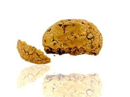 Chocolate chip cookies arranged on white background photo