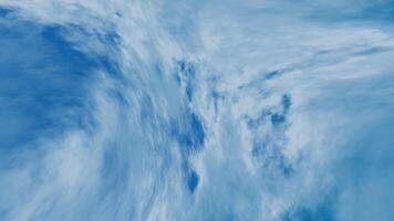 blue sky with wispy, motion-blurred clouds, creating a dreamy and abstract atmosphere. Ideal for background projects video