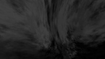 Dark gray background with a smoky, flowing texture. Mysterious and moody video