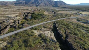 A road cuts through a Iceland Plate Fault. video