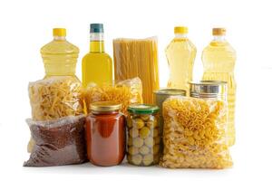 Foodstuffs in donation box isolated on white background with clipping path for volunteer to help people. photo