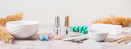 Set of items for manicure and pedicure on the table web banner photo