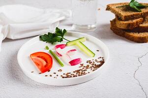 Concept diet on a plate of low-calorie foods on the table photo
